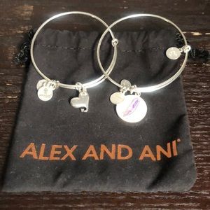Two Alex and Ani Bangles.